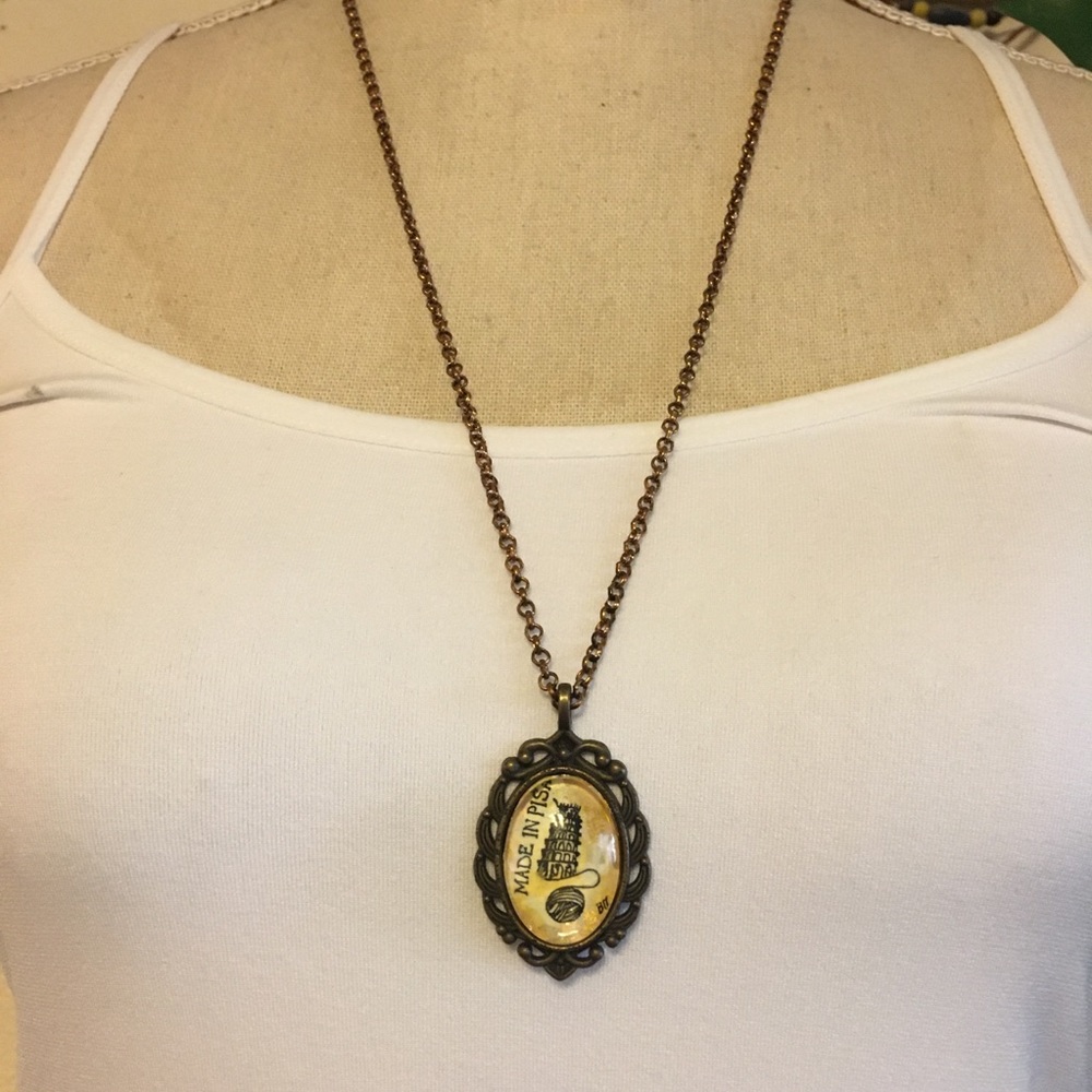 Brass tone Made in Pisa pendant on chain necklace